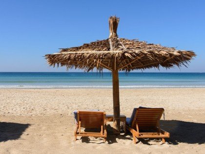 Beach with umbrella and sunbed, Ngapali Beach, Myanmar