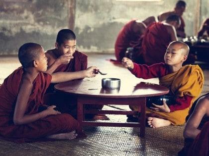 Young Monks eating