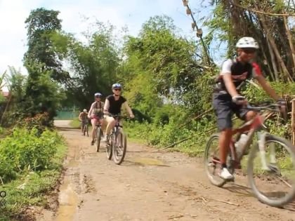 Cycling Group on Gravel Road, Sabah, Borneo