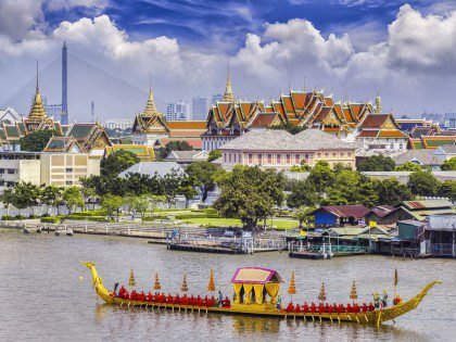 Thai's king palace with goldent guard ship on the front