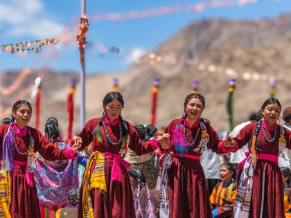 Nepali Girls Performing Traditional Dance Sequence Wearing Traditional Costumes.