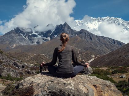Serenity and Yoga Practicing at Himalayas Mountain Range
